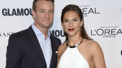 Retired U.S. soccer star Carli Lloyd announces she and her husband are expecting baby in October